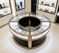Vitrine d'exposition circulaire pour montres de luxe, en acier inoxydable et verre, pour la vente au détail