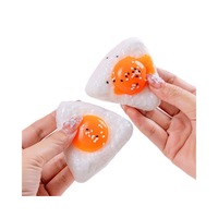 Jouet Squishy en forme de boule de riz jaune d'œuf en TPR, anti-stress, simulation alimentaire Onigiri, pour bureau, cadeau, vente en gros