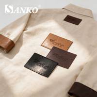 SANKO Accessoires de vêtement écologiques lavables, patchs en denim, étiquettes en cuir véritable avec logo laser personnalisé, forme en rouleau