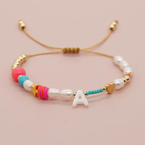 Bracelet tressé en perles avec breloque cœur en coquillage et initiale A-Z faite à <span class=keywords><strong>la</strong></span> main pour femmes et enfants - Product Image 3