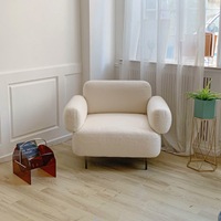 Canapé-lit en tissu bouclé blanc crème confortable au design minimaliste moderne avec cadre en métal noir