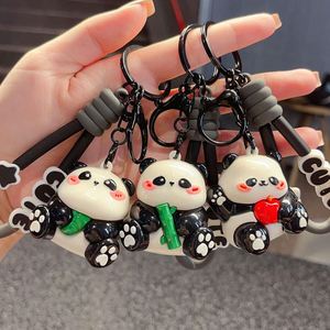 พวงกุญแจแพนด้าการ์ตูนเคลือบสีสันสดใส น่ารัก ทำจาก PVC เหมาะสำหรับคู่รัก ตกแต่งกระเป๋าเป้สะพายหลัง ของประดับรถยนต์ ของขวัญชิ้นเล็ก - Product Image 3