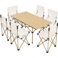 Table de camping FXKS avec 6 chaises, ensemble de pique-nique pliable portable - plateau en aluminium beige, cadre en acier carbone, sac de transport
