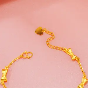 Accessori di moda esplosivi bracciale con fiocco d'oro gioielli da donna in rame placcato oro 24k torta nodo cinese rivale