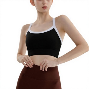 สปอร์ตบราผู้หญิงดีไซน์ล่าสุด สีดำ แต่งขอบสีขาว รองรับระดับปานกลาง เหมาะสำหรับโยคะและออกกำลังกาย สีพื้น สายรัดแบบเส้นเล็ก - Product Image 1