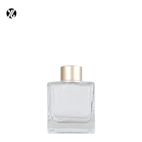 Bouteille d'huile d'aromathérapie d'arôme en verre carré bleu clair avec bâtons de diffuseur de roseau désodorisant bouteille de diffuseur de roseau en verre de parfum