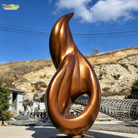 Sculpture de flamme moderne YouFine en acier inoxydable, finition miroir, art métallique pour la décoration de centres commerciaux et de jardins, personnalisable et certifiée