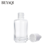 Flacon compte-gouttes en verre cylindrique transparent de 30 ml personnalisé en usine avec matériau recyclable pour les gouttes pour les yeux, les huiles essentielles, bouchon blanc
