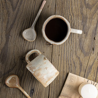 Vente en gros de tasse à café en poterie grossière Japadi rétro tasse à lait en céramique rustique faite à la main irrégulière porcelaine argile thé tasses à café