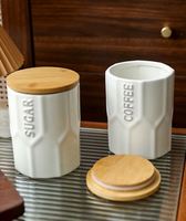Vente en gros de nouveaux ustensiles de cuisine créatifs de qualité alimentaire ensemble de boîtes à café en céramique boîte de rangement personnalisée en relief pour le thé et le sucre avec couvercle en bambou