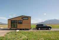 Maison conteneur préfabriquée portable et respirante, mini-maison sur roues, extérieur en bois, portes doubles vitrées pour usage extérieur comme atelier