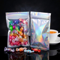 Petit sac zippé en Mylar laser opaque holographique transparent, en plastique aluminisé à dos argenté, avec face avant transparente