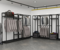 Étagère de présentation de vêtements moderne sur pied, écologique et personnalisée, avec éclairage LED, pour la conception de boutiques de mode.
