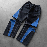 Ensemble de survêtement en nylon personnalisé, coupe-vent, veste zippée color block, pantalon de survêtement détachable, taille plus, survêtement de sport unisexe