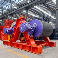 Tambour électrique synchrone à aimant permanent offrant un fonctionnement silencieux et des intervalles de service prolongés pour la manutention de charges en vrac