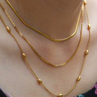 Collier à chaîne à maillons en acier inoxydable à trois couches pour femmes plaqué or Style tendance hypoallergénique étanche pour les fêtes en gros