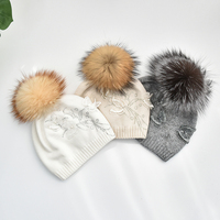 Femme véritable fourrure pompon bonnet chapeaux pour femmes hiver laine tricoté Logo personnalisé bonnet chapeau haute qualité bonnet chapeau pour femmes hiver