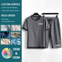 Ensemble deux pièces pour homme en tissu premium respirant et à séchage rapide pour l'été, couleur unie, t-shirt à manches courtes et pantalon oversize