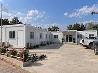 Maison conteneur préfabriquée en acier de 20 pieds, portable, minimaliste, contemporaine, carrée, à assemblage rapide, modulaire, avec panneaux sandwich, pour bar ou salle de sport
