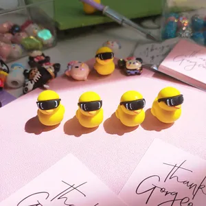 2024 New Arrival Lovely 3D Little Yellow Duck cartoon soft pvc custom pencil topper Chinese plastic pen topper supplier