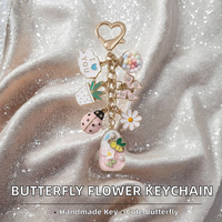 Porte-clés en alliage de zinc motif papillon, fleur, nuages, dessin animé, plantes en pot, insectes, bijoux faits à la main pour femmes et filles