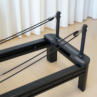 Lit de Pilates complet en aluminium noir robuste avec rail intégral pour la maison et le studio de yoga - Reformer