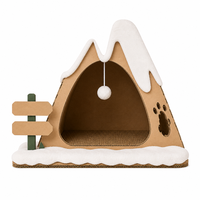 Maison pour chat en carton ondulé, type grotte de montagne enneigée, avec deux pics, fenêtre en forme de patte et boule suspendue