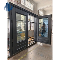 Porte d'entrée pivotante moderne de luxe léger en aluminium moulé avec vitre latérale en verre trempé anti-explosion à texture cannelée verticale