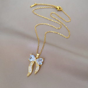 Popular último titanio acero oro cinta arco colgante collar Unisex joyería moda personalidad Internet celebridad - Product Image 3