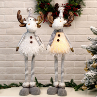 Nouvel arrivage de jouets de cerf de Noël debout Figurines de renne en peluche Jambes rétractables avec ornement de Noël LED