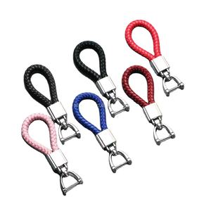 Venta al por mayor de llaveros personalizados de metal trenzado y cuero - Product Image 1