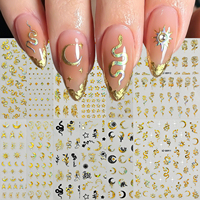 Autocollants d'ongles gothiques métalliques dorés de luxe, 12 pièces, motifs serpent, lune, papillon, floraux, auto-adhésifs, fournitures pour ongles esthétique sombre et sorcière