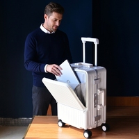Valise rigide en PC durable, vente en gros d'usine, ouverture frontale, serrure approuvée TSA, support de téléphone, crochet dissimulé