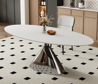 Ensemble de table à manger moderne italienne de style soucoupe volante avec plateau en marbre réglable en hauteur et base en acier inoxydable
