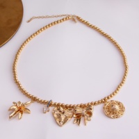 Style de vacances pour femmes géométrie irrégulière amour arc coquille laiton plaqué or pendentif chaînes classiques présentant un charme de personnalité