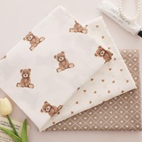Tissu en coton pur doux, bonne respirabilité pour les vêtements de nuit et la vaisselle de table
