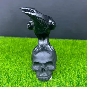 Großhandel hochwertige hand geschnitzte Obsidian Krähe Edelstein Schädel geschnitzte Kristall Schädel Kristall Handwerk Schädel
