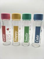 Jolie bouteille d'eau en verre borosilicate coloré arc-en-ciel