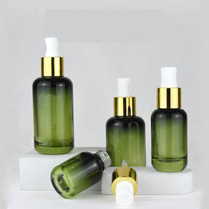 Flacon compte-gouttes à bouton-poussoir dégradé de luxe à baril rond fond épais 30ml huile essentielle 4 oz flacon compte-gouttes en verre vert 100ml - Product Image 3