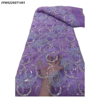 Tissu en dentelle de tulle brodé de fleurs et de perles pour robe de mariée