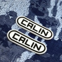 Étiquette en caoutchouc PVC souple personnalisée haut de gamme avec logo 3D à coudre, accessoire de mode premium pour vêtements, patch en forme d'étoile ou de fleur avec strass