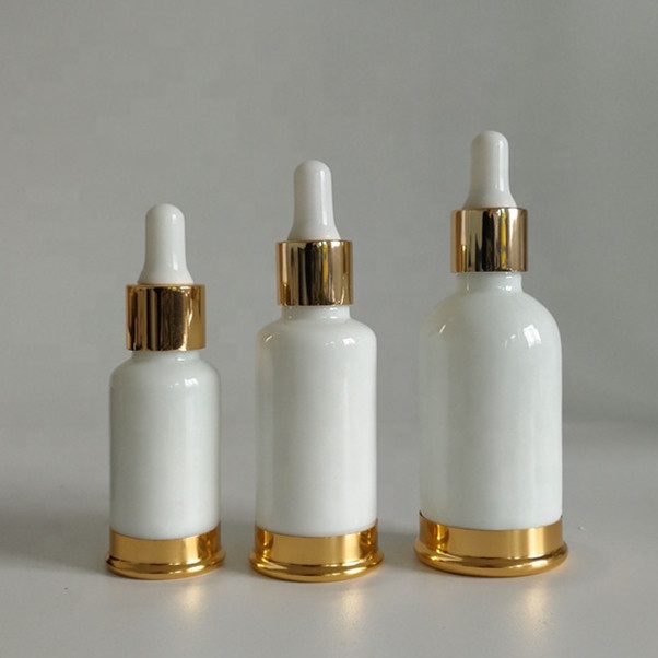 Luxury essential oil 10ml 15ml 20ml 30ml 50ml 100ml white porcelain pipette dropper bottle with gold bottom base