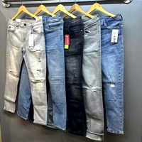 Jean Boyfriend Taille Haute Homme Coupe Slim avec Revers Roulés en Denim Extensible Décontracté – Collection Automne/Hiver Style Urbain