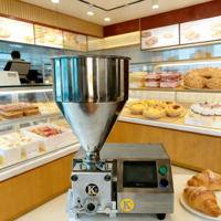 Petite machine commerciale automatique pour la décoration de gâteaux, le remplissage et le dépose de crème, confiture, chocolat, mousse, pâte feuilletée, beignets, pain et cupcakes