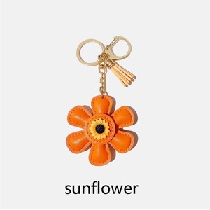 Porte-clés de luxe pour femme avec pompons tournesol en cuir PU, pendentif et breloque pour sac, nouveauté - Product Image 4
