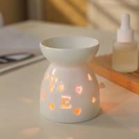 Diffuseur d'arômes en céramique petit format, design ajouré multi-fleurs, mignon, pour huiles essentielles, lampe aromatique, fourni directement par le fabricant