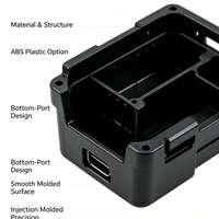 Boîtier moulé par injection en ABS noir personnalisé avec port inférieur et languettes de fixation pour module de contrôle industriel