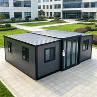 Maison modulaire en conteneur de 20 pieds, construction en panneaux sandwich, système d'énergie solaire pour logement de bureau