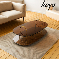 Meubles de luxe ovales tables basses rondes en verre table à thé moderne en pierre de terrazao design pour le salon