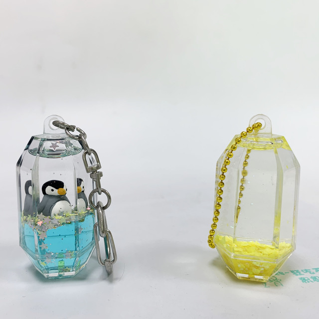 Novelty Six Angle Shape Plastic Key Chains Floating Scarecrow Liquid Motion Aqua Pendant Customized Color Portable Carabiner